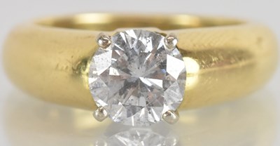 Lot 1217 - An 18ct yellow gold diamond solitaire ring,...
