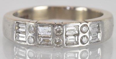 Lot 1233 - An 18ct white gold diamond set ring, set with...