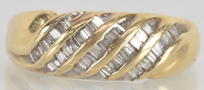 Lot 1277 - A 14ct yellow gold diamond set ring, set with...