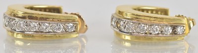 Lot 1479 - A pair of 18ct yellow gold diamond set seven...