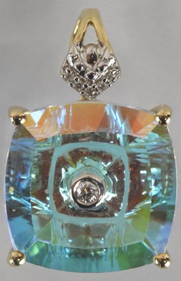 Lot 1475 - A 9ct white gold blue topaz and diamond set...