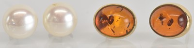 Lot 1510 - A pair of 9ct yellow gold amber set earrings...