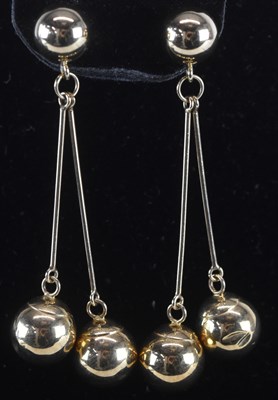 Lot 1505 - A pair of 14ct yellow gold drop earrings,...