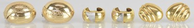 Lot 1496 - Two pairs of yellow metal shell type earrings...