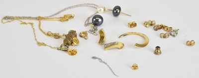Lot 1202 - A quantity of scrap 9ct gold, yellow and white...