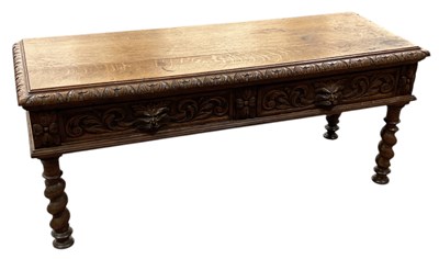 Lot 79 - A Victorian carved oak low two drawer side...