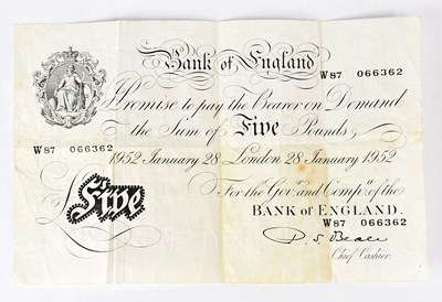 Lot 634 - BANK OF ENGLAND; a £5 note (white fiver),...