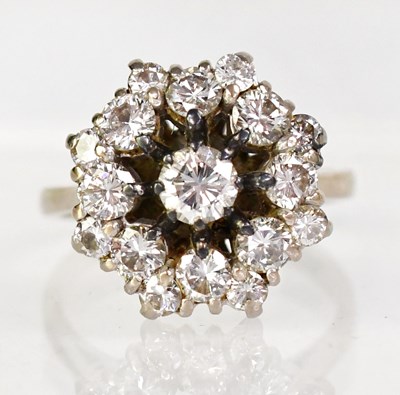 Lot 771 - An 18ct white gold cluster ring in the form of...