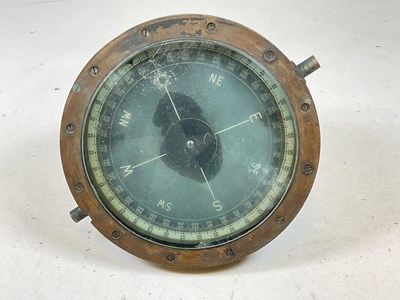 Lot 65 - A early 20th century brass framed ship's...