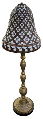 Lot 116 - A mid 20th century Eastern style brass reading...