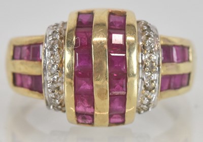 Lot 1321 - A 9ct gold ruby and diamond set ring in the...