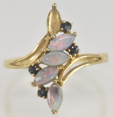 Lot 1324 - A 9K gold opal and sapphire set floral style...