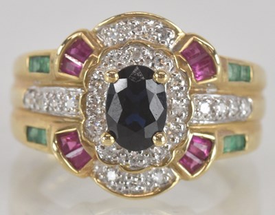 Lot 1325 - A contemporary 9ct gold sapphire, diamond,...