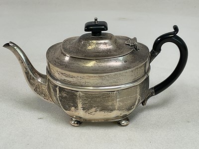 Lot 495 - A George V hallmarked silver teapot of...