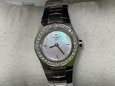 Lot 620 - TISSOT; a lady's stainless steel wristwatch...