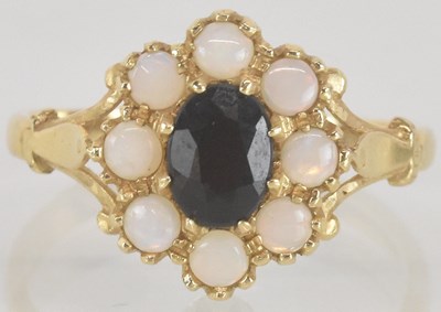 Lot 1293 - A 14ct gold dress ring, with claw set cut...