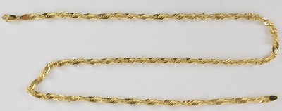 Lot 1403 - A 9ct gold necklace with spiral links in a...