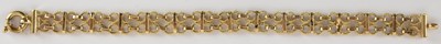 Lot 1605 - A 9ct gold double row ring link bracelet with...