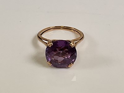 Lot 563 - A yellow metal dress ring, with large four...