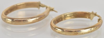 Lot 1520 - A pair of 9ct gold hoop earrings, length 3cm,...