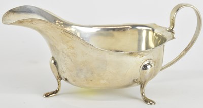 Lot 1100 - VINERS; a George V hallmarked silver sauceboat...