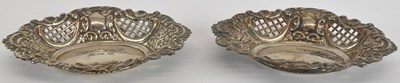 Lot 1141 - A pair of pierced small dishes with blank...