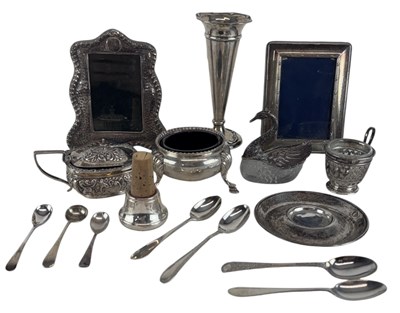 Lot 1059 - A small collection of silver and white metal,...