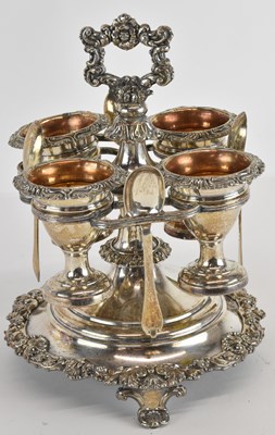 Lot 1012 - A Victorian silver plated set of four egg cups...