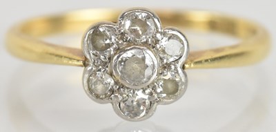 Lot 1274 - An 18ct yellow gold diamond flower head...