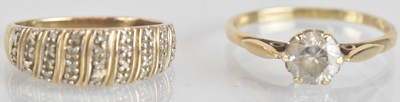 Lot 1292 - A 9ct yellow gold white stone solitaire ring,...