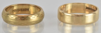 Lot 1267 - A 9ct yellow gold wedding band, size I, and a...