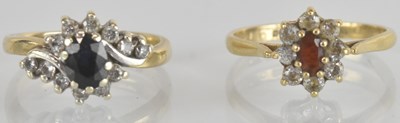 Lot 1305 - A 9ct yellow gold diamond and sapphire set...
