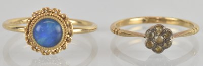 Lot 1306 - A 9ct yellow gold opal set dress ring, size M,...