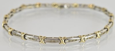 Lot 1603 - A 9ct yellow and white gold diamond set...