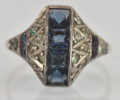 Lot 1329 - A 9ct yellow gold Art Deco style blue and...
