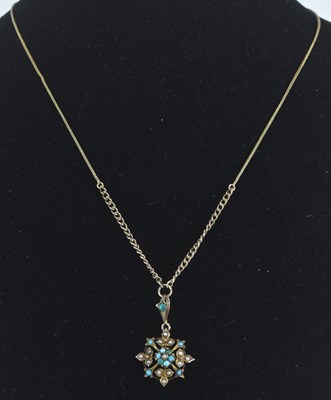 Lot 1440 - A 9ct yellow gold turquoise and seed pearl set...