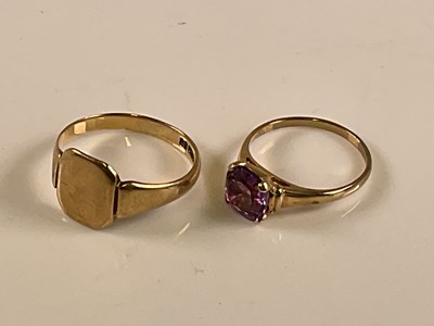 Lot 568 - A 9ct yellow gold signet ring, size V 1/2, and...