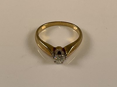 Lot 578 - A 14ct yellow gold diamond solitaire ring, the...