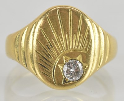 Lot 1231 - An 18ct yellow gold diamond set signet ring,...