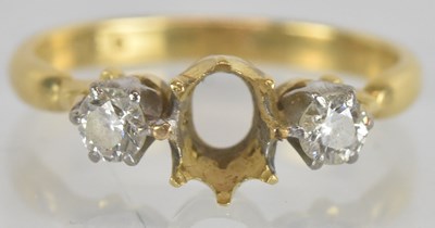 Lot 1266 - An 18ct yellow gold diamond set three stone...
