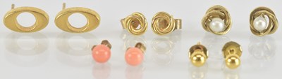 Lot 1268 - Five pairs of yellow metal earrings and ear...