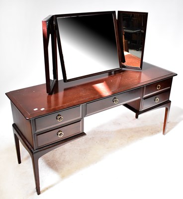 Lot 76 - A Stag Minstrel dressing table, with triptych...