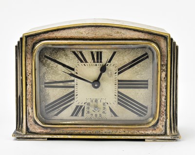 Lot 1493 - An Art Deco silver plated eight day mantel time piece
