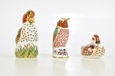 Lot 146 - ROYAL CROWN DERBY; three paperweights...