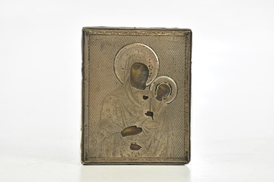 Lot 1357 - A white metal mounted religious icon of...
