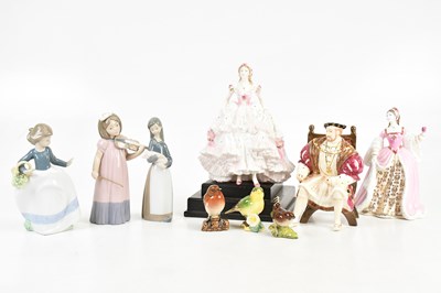 Lot 147 - A collection of ceramic figures, comprising...