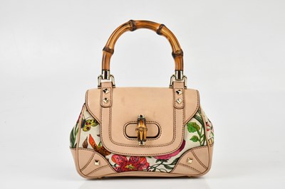 Lot 149 - GUCCI; a floral print canvas handbag with...