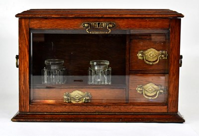 Lot 326 - A Victorian oak writing box, glass fall front...