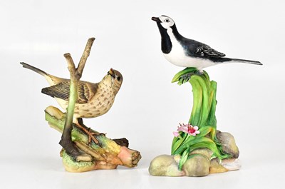 Lot 174 - COALPORT; two figures of birds, comprising...