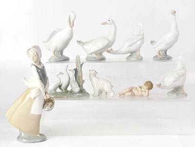 Lot 182 - NAO; various figures, including a lady holding...